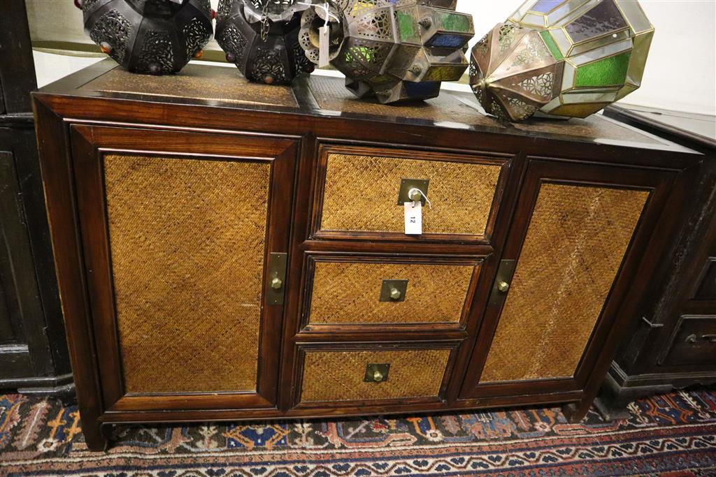 An Indian hardwood and rattan sideboard, width 140cm, depth 50cm, height 87cm